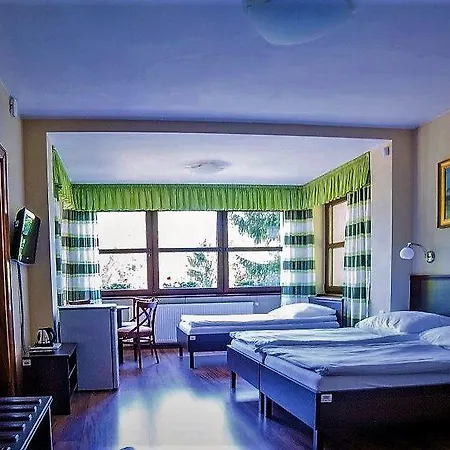 Quarto em Acomodações Particulares Pokoje Goscinne Pod Sosnami *