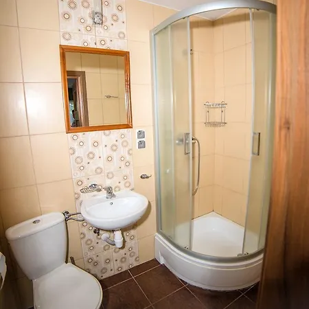 Проживание в семье Pokoje Goscinne Pod Sosnami