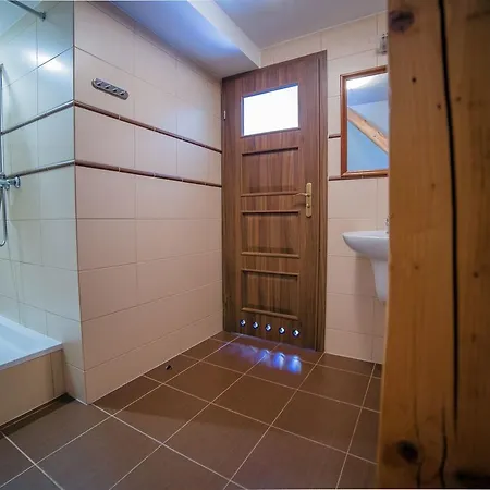 Проживание в семье Pokoje Goscinne Pod Sosnami